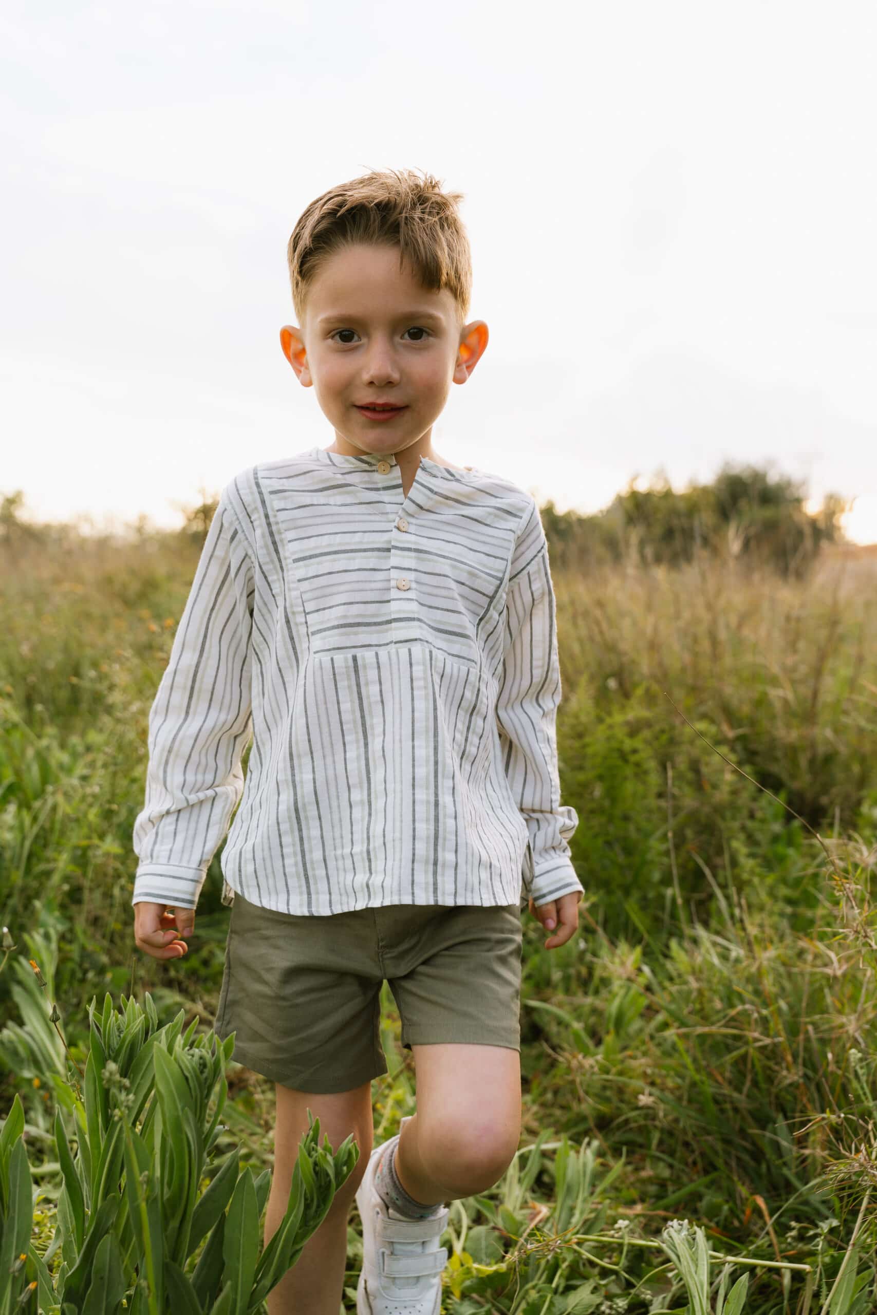 Bermuda de niño verde con bolsillos laterales